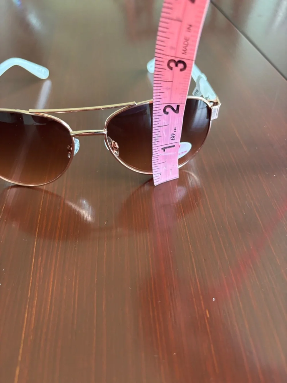 Juicy Coutture 100% UVA-UVB protect,brown gradient lens,gold frame,white arms
